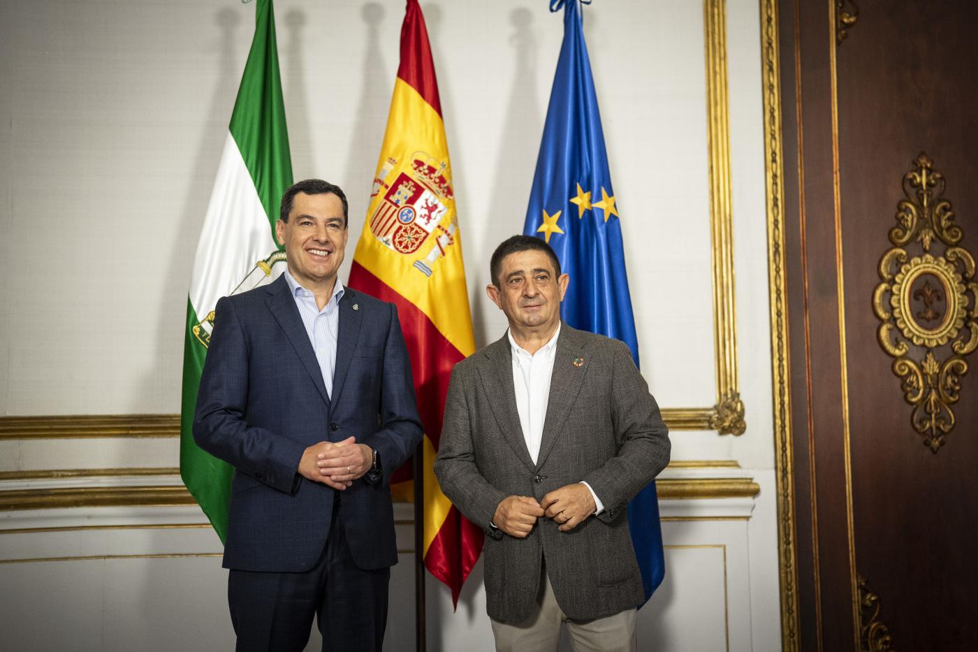 Juanma Moreno y Francisco Reyes. - Junta.
